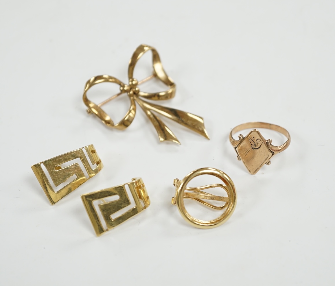 A pair of 14k earrings, 18mm, 3.4 grams and four 9ct items including an earring, two rings and a brooch, gross 11.3 grams. Condition - fair